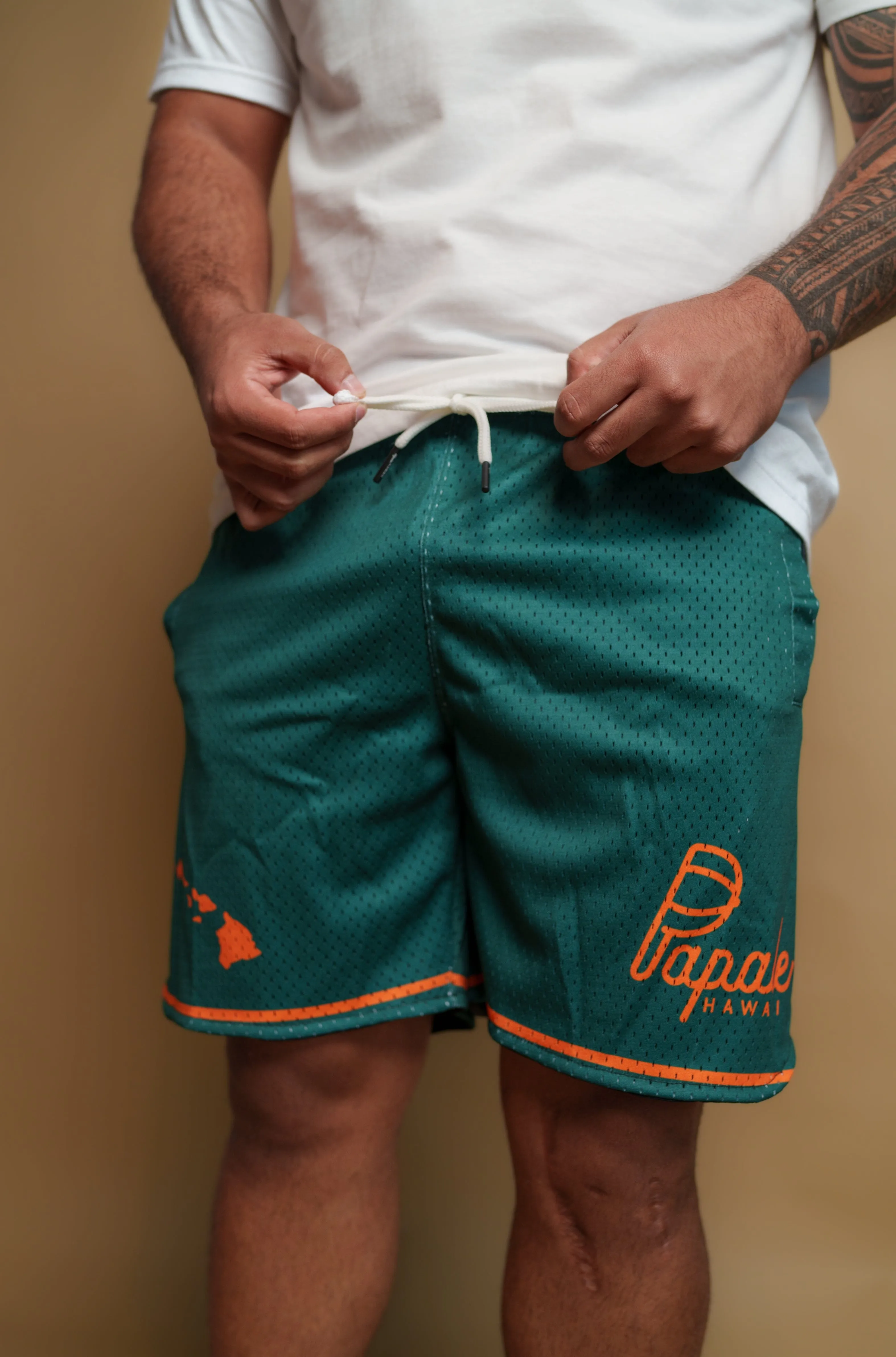 PĀPALE GREEN & ORANGE MESH SHORTS